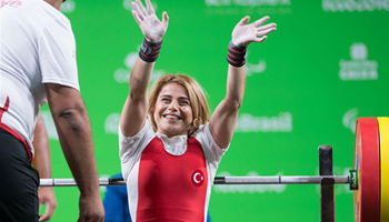 Nazmiye Muratli of Turkey wins gold of Women's 41kg of powerlifting