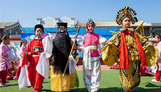 Peking opera troupers introduce traditional art to students in Inner Mongolia