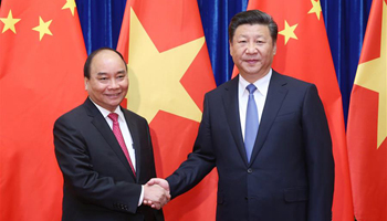 Xi urges China, Vietnam to solve South China Sea issue through consultation