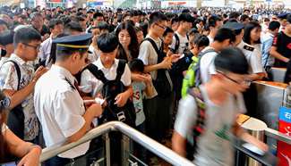 Railway stations across China witness surging passenger flows