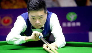 Ding Junhui competes at 2016 Shanghai Masters world snooker tournament