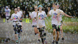 People participate in 5km Color Run in Vancouver