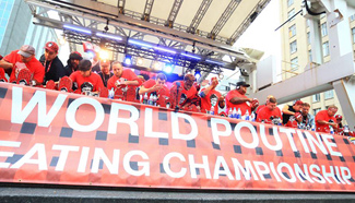 7th Annual World Poutine Eating Championship held in Toronto