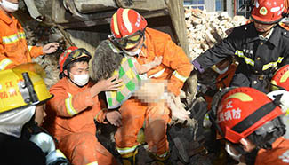 Girl rescued at E China's collapsed house