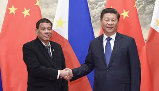 Xi, Duterte agree on full improvement of ties