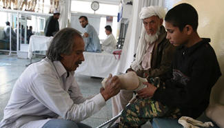 Disabled Afghans receive treatment at ICRC Orthopedic Center in Kabul