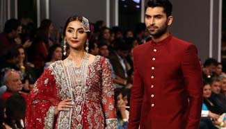 Models present creations at Fashion Pakistan Week