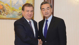 Chinese FM meets Uzbek acting president, FM on relations