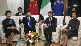 President Xi meets Italian PM in Sardinia