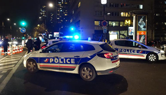 Seven people held hostage by armed robber in Paris