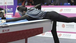 Pan Xiaoting competes in nine ball game