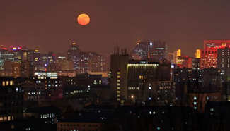 Moon seen over Beijing