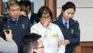 S.Korean president's confidante attends first court hearing in Seoul