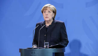 Merkel says must assume Berlin market carnage to be terrorist attack