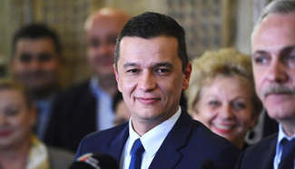 Romanain president designates Social Democrat Grindeanu as PM