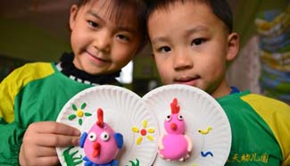 Chinses children celebrate Spring Festival in their own way