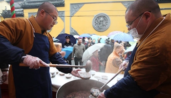 People eat special porridge to pray for harvest at Laba Festival