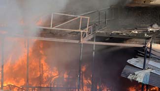 Fire breaks out inside furniture market in Pakistan