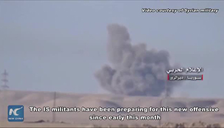 Raw: IS unleashes violent offensive on gov’t positions in Syria