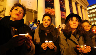 People take part in "Lights for Rights" rally in Brussels