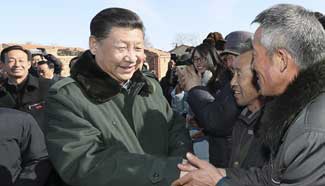 Xi pushes poverty alleviation