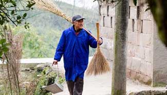 Pic story: Qin Guanxiao, beneficiary from poverty alleviation plan
