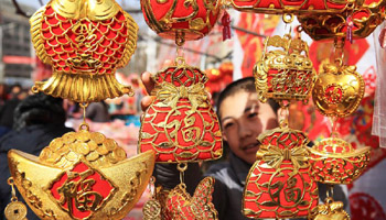 People purchase goods for upcoming Spring Festival across China