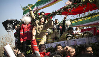 Iranians mourn 16 firefighters killed in Tehran building collapse