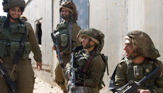 Soldiers take part in training exercise in Negev desert, Israel