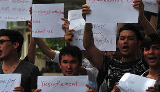Asylum seekers protest in front of UNHCR in Indonesia