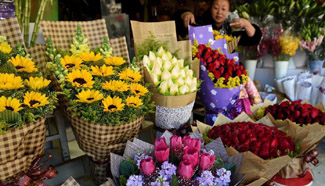 In pics: flower market in SW China's Yunnan
