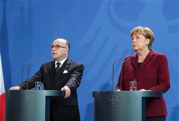 Merkel, visiting French PM attend news conference in Berlin