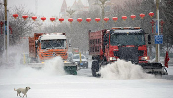 China issues blue alert for cold wave brought by blast of strong cold air