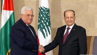 Abbas vows to ensure return home for Palestinian refugees in Lebanon