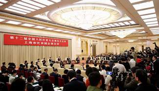 Plenary meeting of 12th NPC deputies from Shanghai opens to media