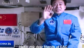 Message in a shuttle: Chinese and EU astronauts have warm video-chat