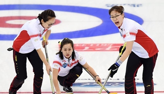 China wins Denmark 7-5 during World Women's Curling Championship
