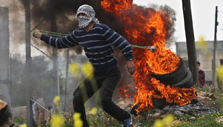 Palestinian protesters clash with Israeli soldiers in Kufr Qadoom village