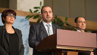 Syria's opposition delegation leader holds press conference in Geneva