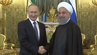 Iranian president seeks turning point in ties ahead of Putin meeting