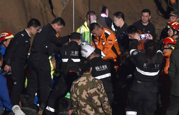 Child lifted from 15-meter deep well in east China