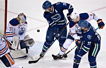 National Hockey League match: Edmonton Oilers vs. Vancouver Canucks