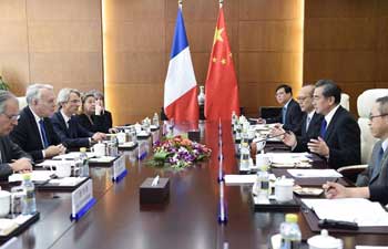 Wang Yi holds talks with French counterpart in Beijing