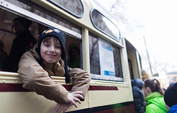 People attend tramway parade in Moscow