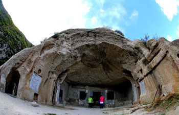Tourists visit rock cave of Northern Wei Dynasty in north China's Hebei