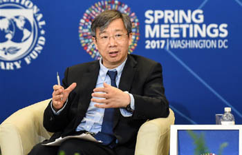 Yi Gang speaks at forum during IMF/World Bank Spring Meetings