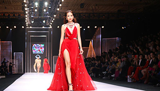 Models present creations at Vietnam Int'l Fashion Week