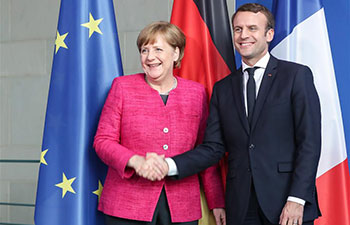 Merkel meets visiting French President Macron in Berlin