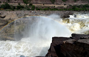 In pics: Hukou Waterfall of Yellow River in N China
