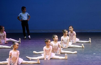 Students show ballet skills during joint performance in Beijing
